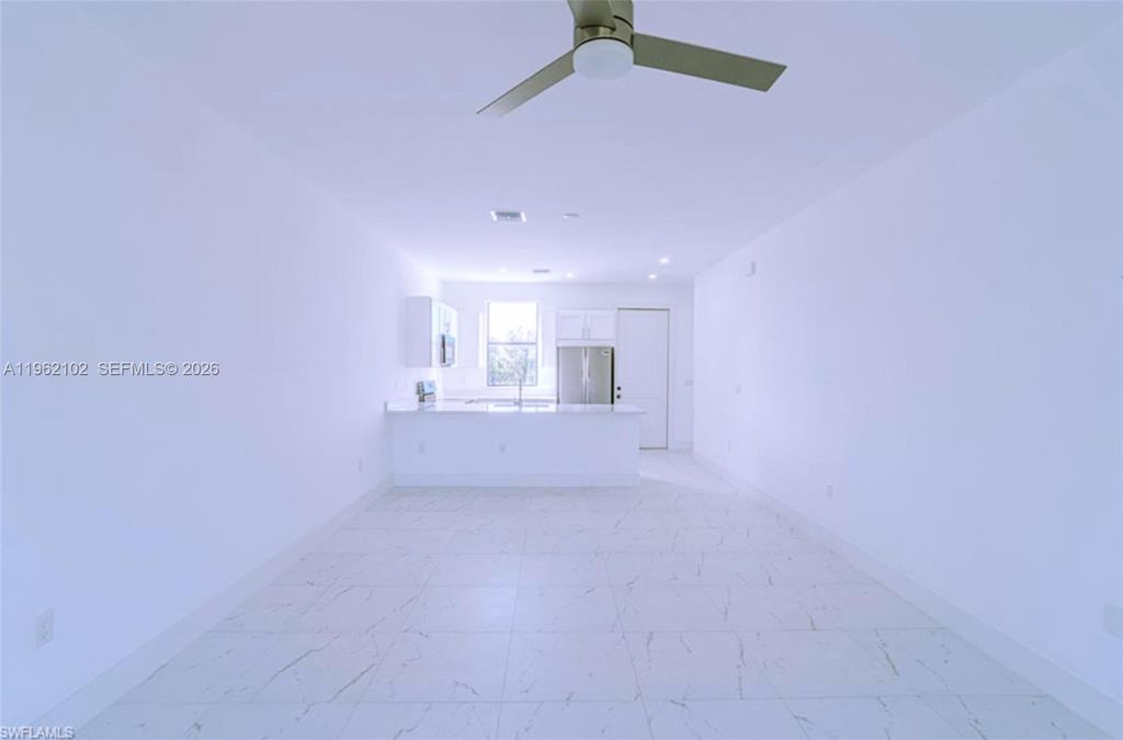 Photo of 1116 Capetown Ave, Lehigh Acres, FL 33974 (MLS # A11962102)