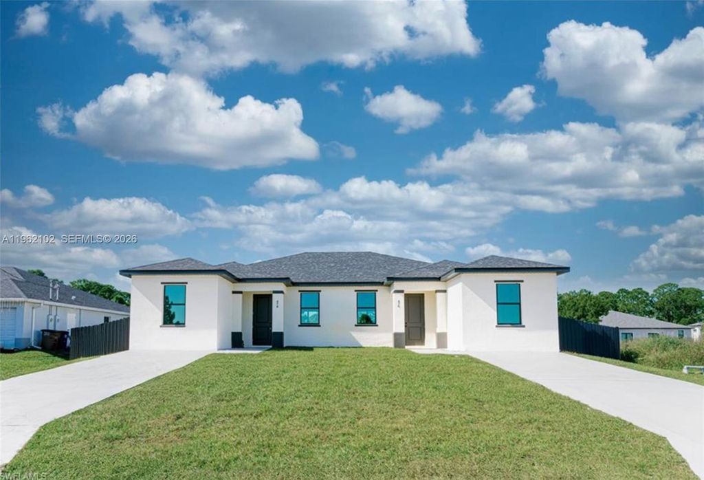 Photo of 1116 Capetown Ave, Lehigh Acres, FL 33974 (MLS # A11962102)