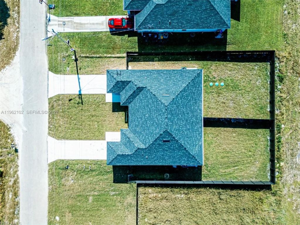 Photo of 1116 Capetown Ave, Lehigh Acres, FL 33974 (MLS # A11962102)