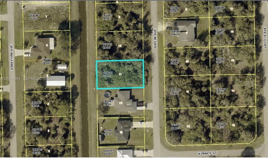 Here is your chance to secure a prime canal-view residential lot in Lehigh Acres, FL — a community experiencing remarkable growth and strong demand from buyers across the country. This parcel on Joplin Avenue backs to a peaceful canal, offering the kind of tranquil water views that make Florida living truly special. Surrounded by existing homes and new construction activity, your future build will enjoy a welcoming neighborhood feel from day one. Close proximity to Lee Boulevard (SR-884) means effortless access to Fort Myers, Cape Coral, and all the shopping, dining, and employment opportunities Southwest Florida has to offer. No deed restrictions and no HOA mean you and your builder call the shots. Utilities are accessible in the area. Lock in your canal-view piece of Lehigh Acres before prices climb further.
