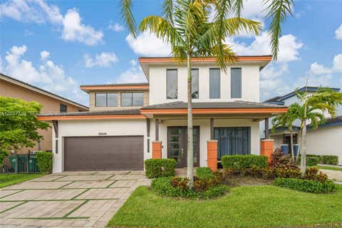 Photo of 15540 NW 88th Ave, Miami Lakes, FL 33018 (MLS # A12017184)