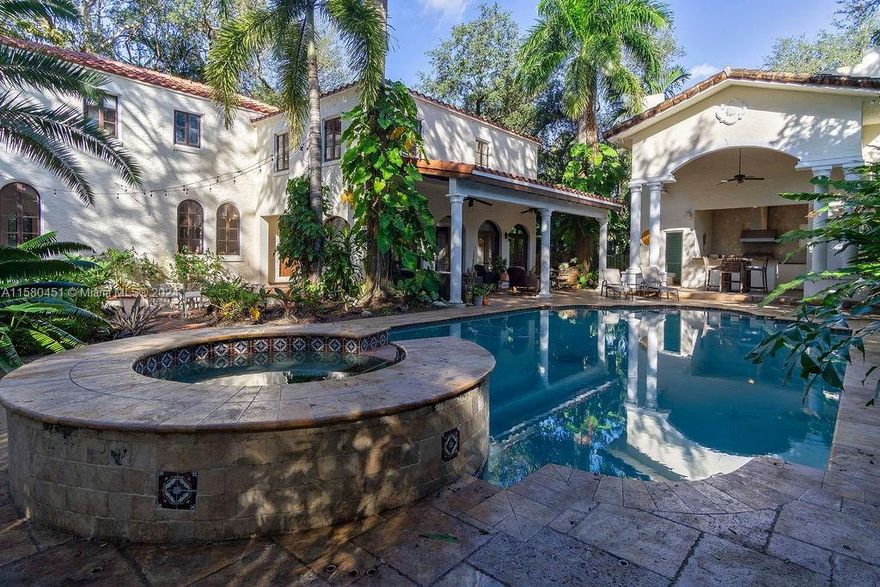 BEAUTIFUL 2-STORY HOME BUILT IN THE 1920S, ONE OF THE FIRST HOMES BUILT IN MIAMI SHORES. BIG LOT, POOL WITH SPA, LUSH LANDSCAPING AND GREAT OUTDOOR ENTERTAINING SPACES. A SECOND STRUCTURE THAT HAS ONE BEDROOM AND 2 FULL BATHS, ONE NEXT TO THE POOL, PLUS AN AWESOME OUTDOOR KITCHEN AREA AND STORAGE. 4 BEDROOMS, 4.5 BATHS PLUS OFFICE AREA BOTH IN THE MAIN HOUSE AND SECOND STRUCTURE. LARGE ENTRY FOYER WITH ORIGINAL MOSAIC FLOORS. BIG LIVING ROOM WITH ORIGINAL WOOD BURNING FIREPLACE, BIG DINING ROOM WITH ACCESS TO THE OUTDOOR SPACES AND LARGE FAMILY ROOM. EAT-IN KITCHEN WITH A LOT OF STORAGE SPACE AND COUNTERTOP SPACE. THE PRIMARY BEDROOM HAS A SITTING AREA, A WALK-IN CLOSET AND GOOD SIZED BATHROOM. WALK TO PLACES TO EAT/DRINK, MOVIES AND PLAYS, SHOPPING AND MORE.