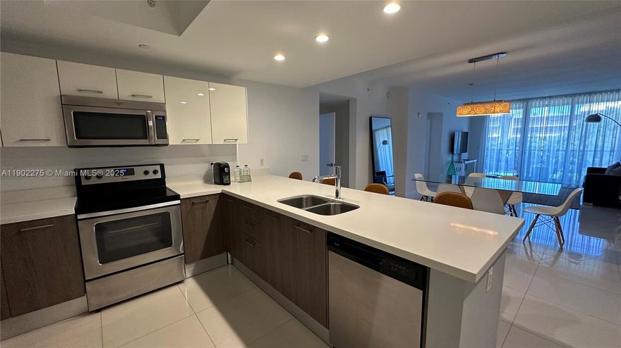 Discover this stunning fully furnished 2-bedroom, 2-bath apartment at Bay Breeze Residences—perfect for investors, new buyers, or families seeking a stylish, turnkey property! Certified as a short-term rental, it offers lucrative income potential right away. The apartment features a fully equipped kitchen with premium granite countertops, and curtains and blackouts installed throughout the entire unit. The building boasts a rooftop pool and provides 2 parking spaces per unit.  Don’t miss out on this incredible opportunity!