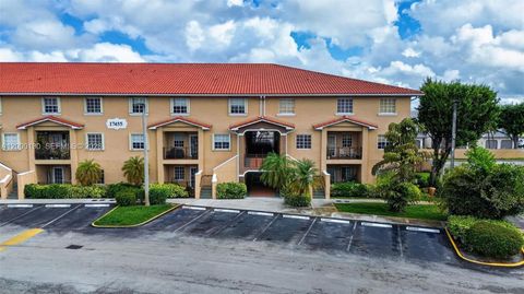 Photo of 17455 NW 75th Pl #203, Hialeah, FL 33015 (MLS # A12000130)