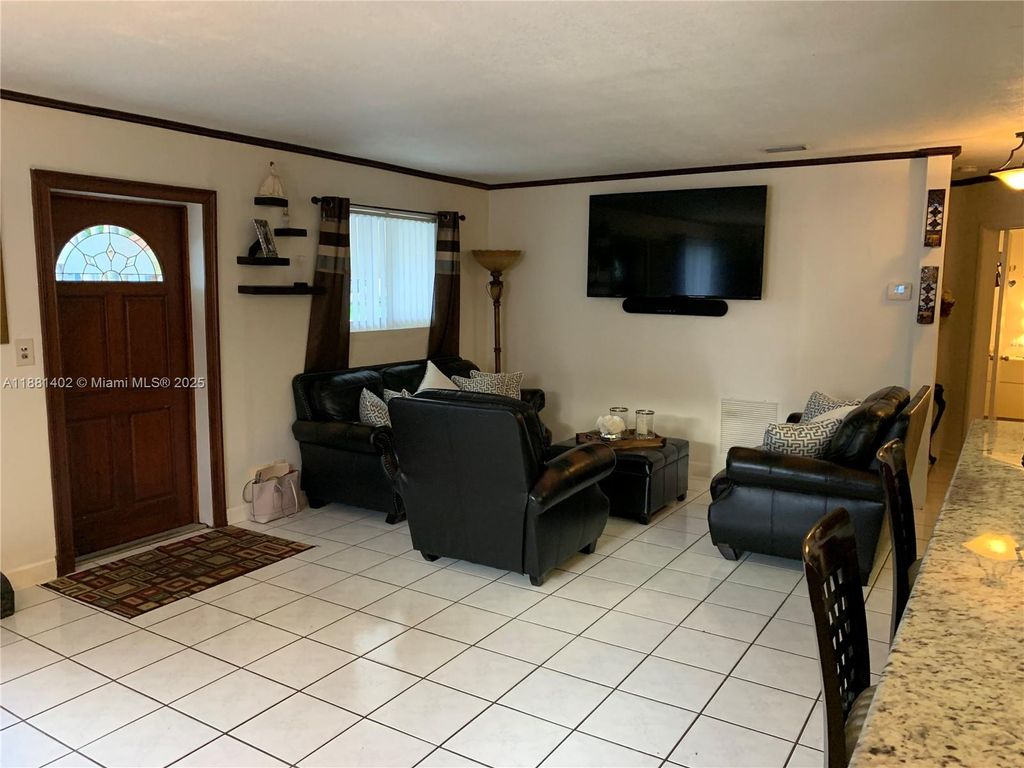 Photo of 6180 SW 42nd Ct, Davie, FL 33314 (MLS # A11881402)