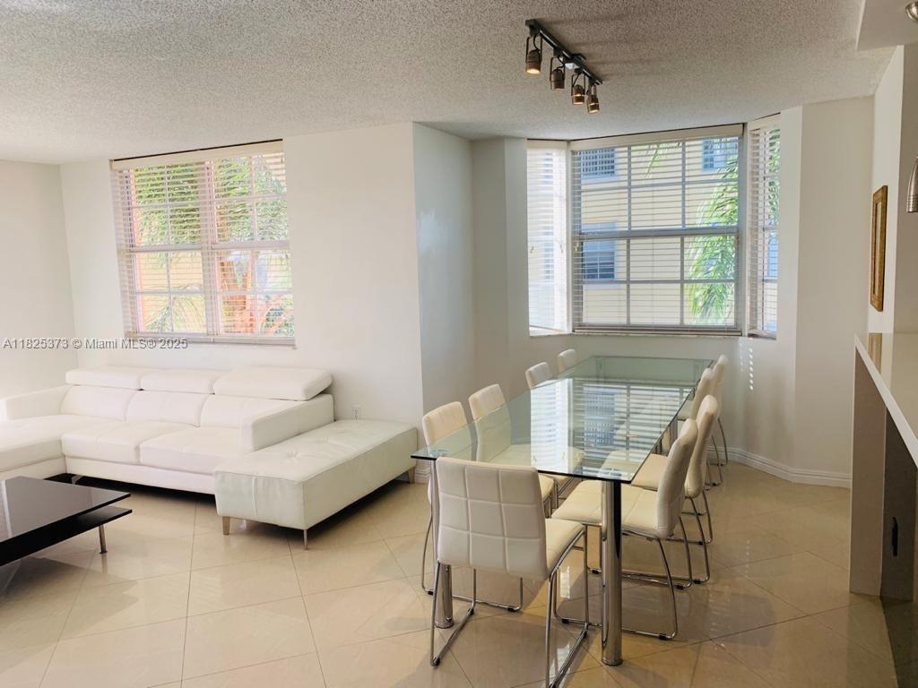 Furnished and modern 3-bedroom 2-bath corner unit with direct water views at the Yacht Club in Aventura. Bright and upgraded interior with plenty of natural light. Available for rent in a resort-style community close to the beach, Aventura Mall, dining, and a 3-mile fitness path around the Turnberry golf course. Community amenities include a tropical pool, jacuzzi, BBQ area, gym, tennis and basketball courts, business center, on-site management, and a kids' play area. Tenant occupied until July 31.