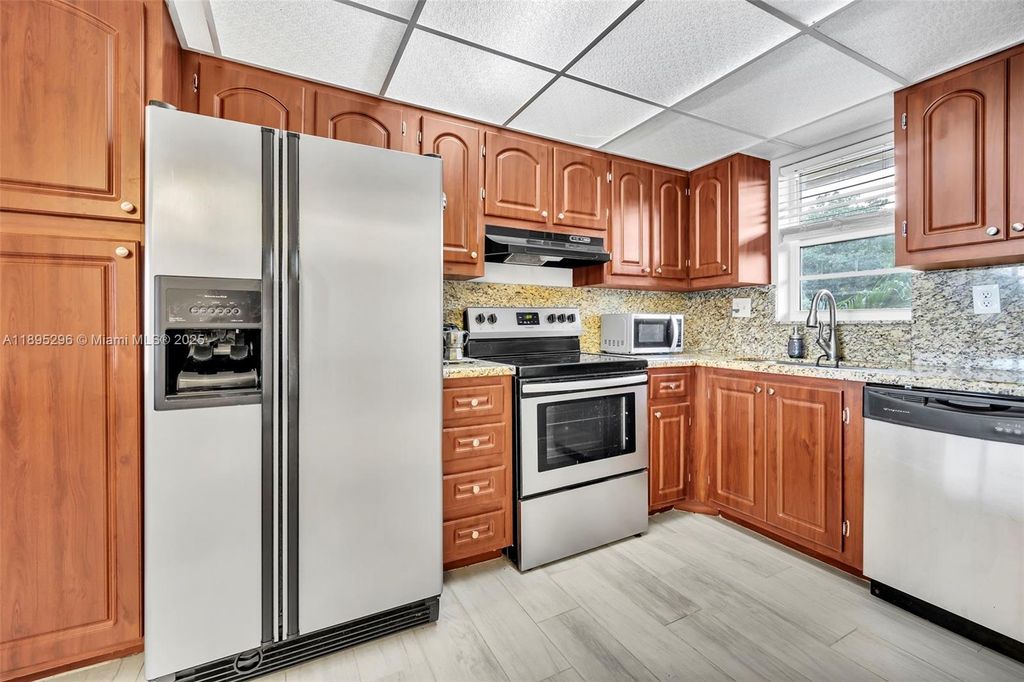 Photo of 3300 W Rolling Hills Cir #307, Davie, FL 33328 (MLS # A11895296)