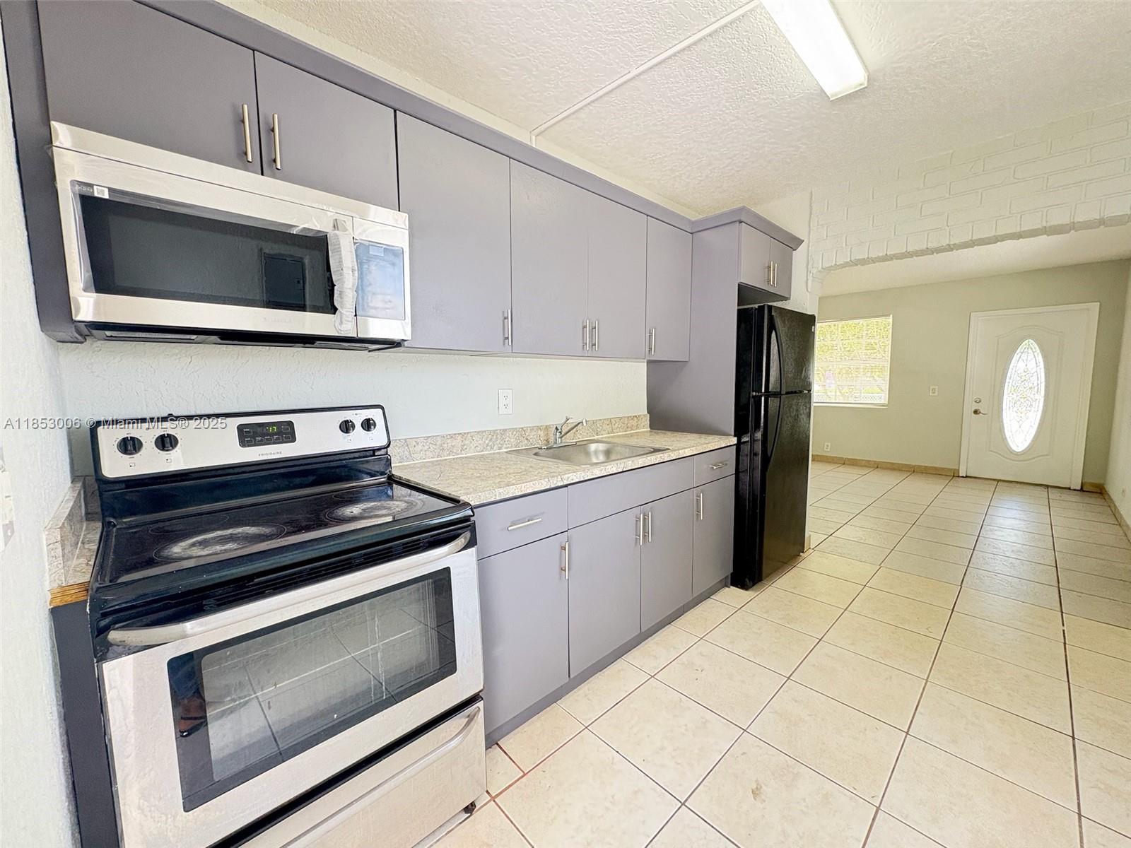 Very well-located single-family home in Pompano Beach, featuring two bedrooms and one bathroom, + a small office and laundry room. Tile throughout, NO carpet. Easy to show. Very well located, close to major public transportation. This property will be delivered to the tenants with stainless steel appliances. (Refrigerator, Micro, and electric Range). If a pet is approved, a non-refundable deposit of $300 will be required. Dogs can weigh up to 20 pounds; landlords don’t accept dogs weighing over that. Before moving in, the landlord requires mandatory renter insurance, the first month, and two security deposits.
