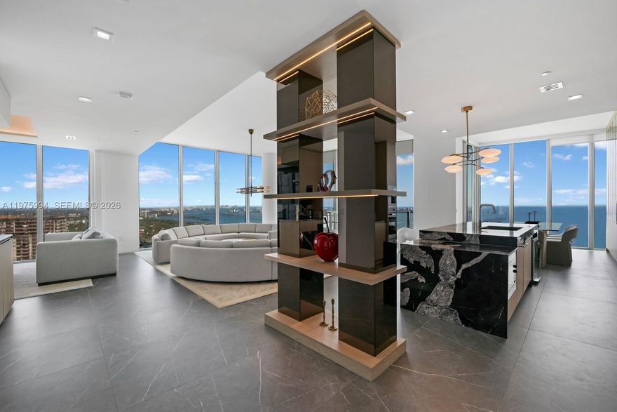 Completely reimagined and taken down to the studs, Residence 4602 at Biscayne Beach has been masterfully redesigned into a stunning four-bedroom sky home. This exceptional residence features some of the most elevated kitchen and bathroom finishes seen in a Miami condominium, with custom cabinetry, top-of-the-line appliances, and exquisite stone and designer details throughout. Floor-to-ceiling glass showcases breathtaking views of Biscayne Bay, Miami Beach, and the city skyline from the 46th floor, filling the home with natural light. Located in the prestigious Biscayne Beach, residents enjoy world-class amenities including a bayfront pool deck, beach club, fitness center, tennis courts, spa, concierge, and private elevators. A rare opportunity to own a fully custom luxury residence in the heart of Edgewater.