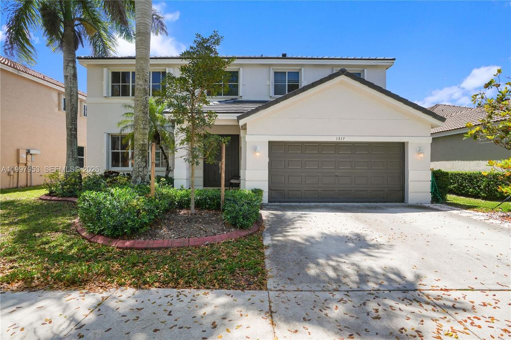 Photo of 1317 Chenille Cir, Weston, FL 33327 (MLS # A11997953)
