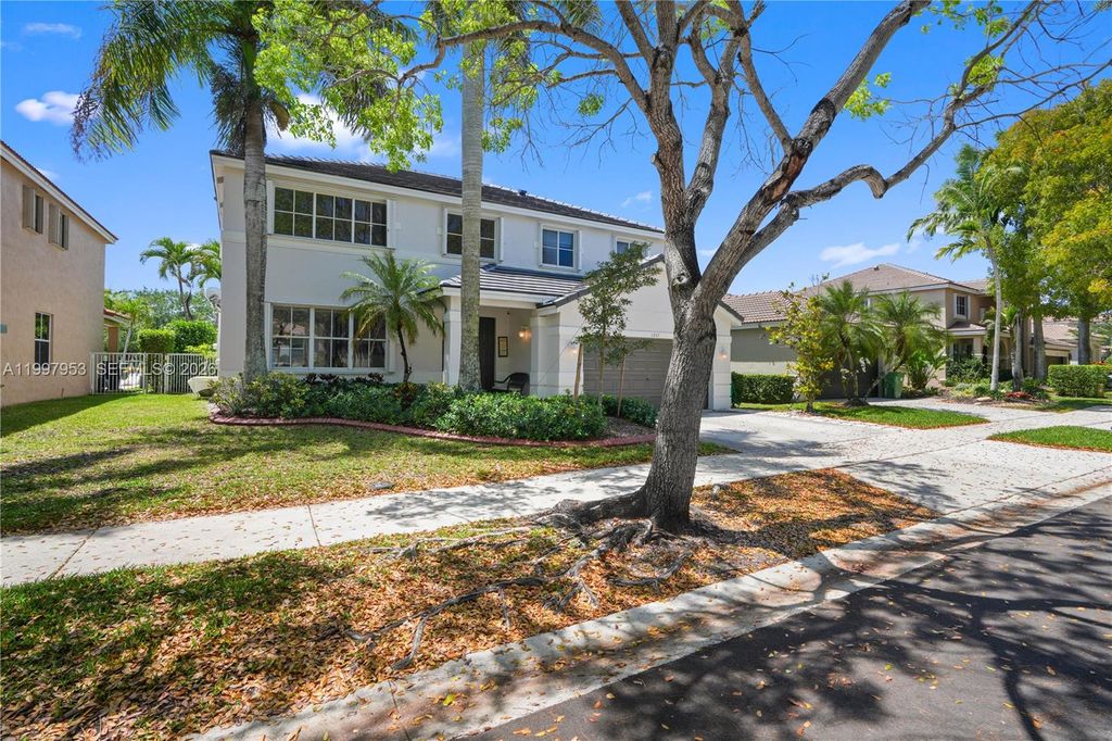 Photo of 1317 Chenille Cir, Weston, FL 33327 (MLS # A11997953)