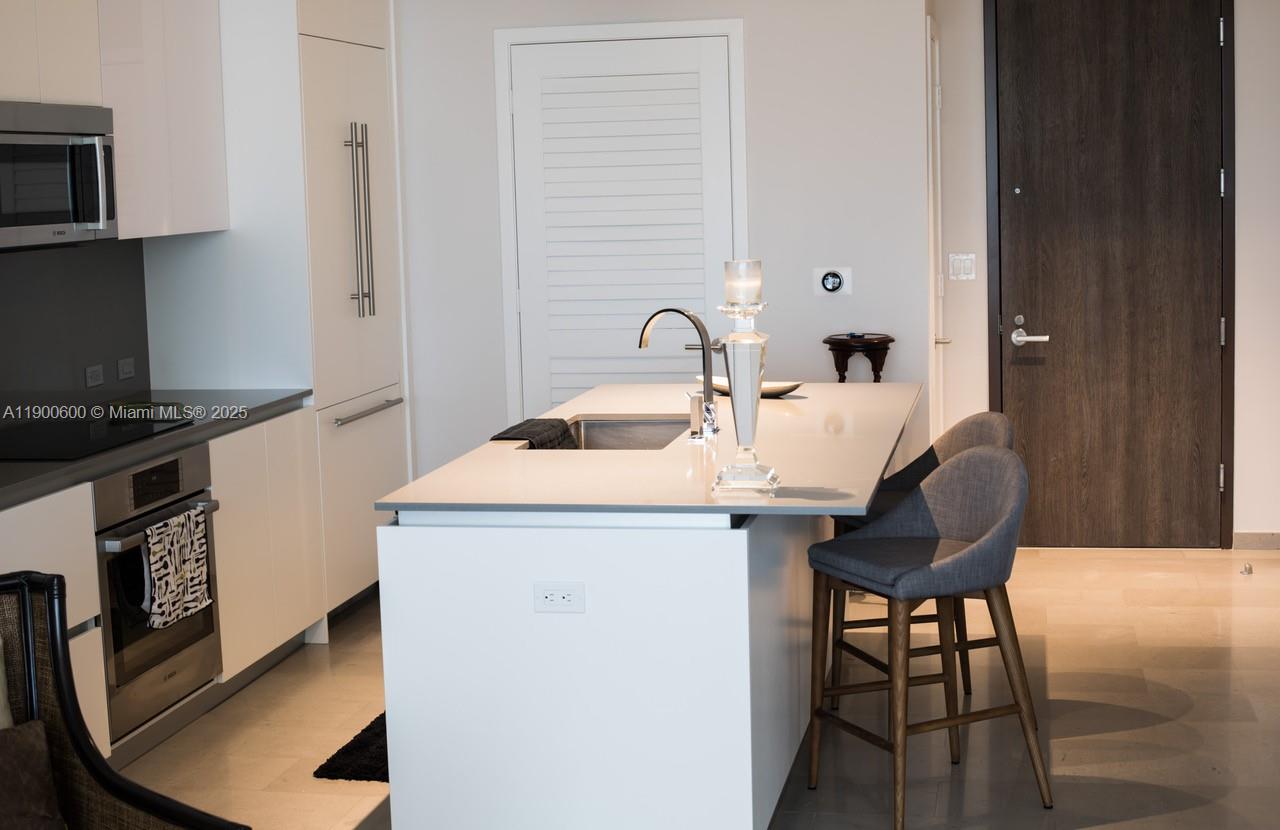 REACH CONDO - Residential Lease