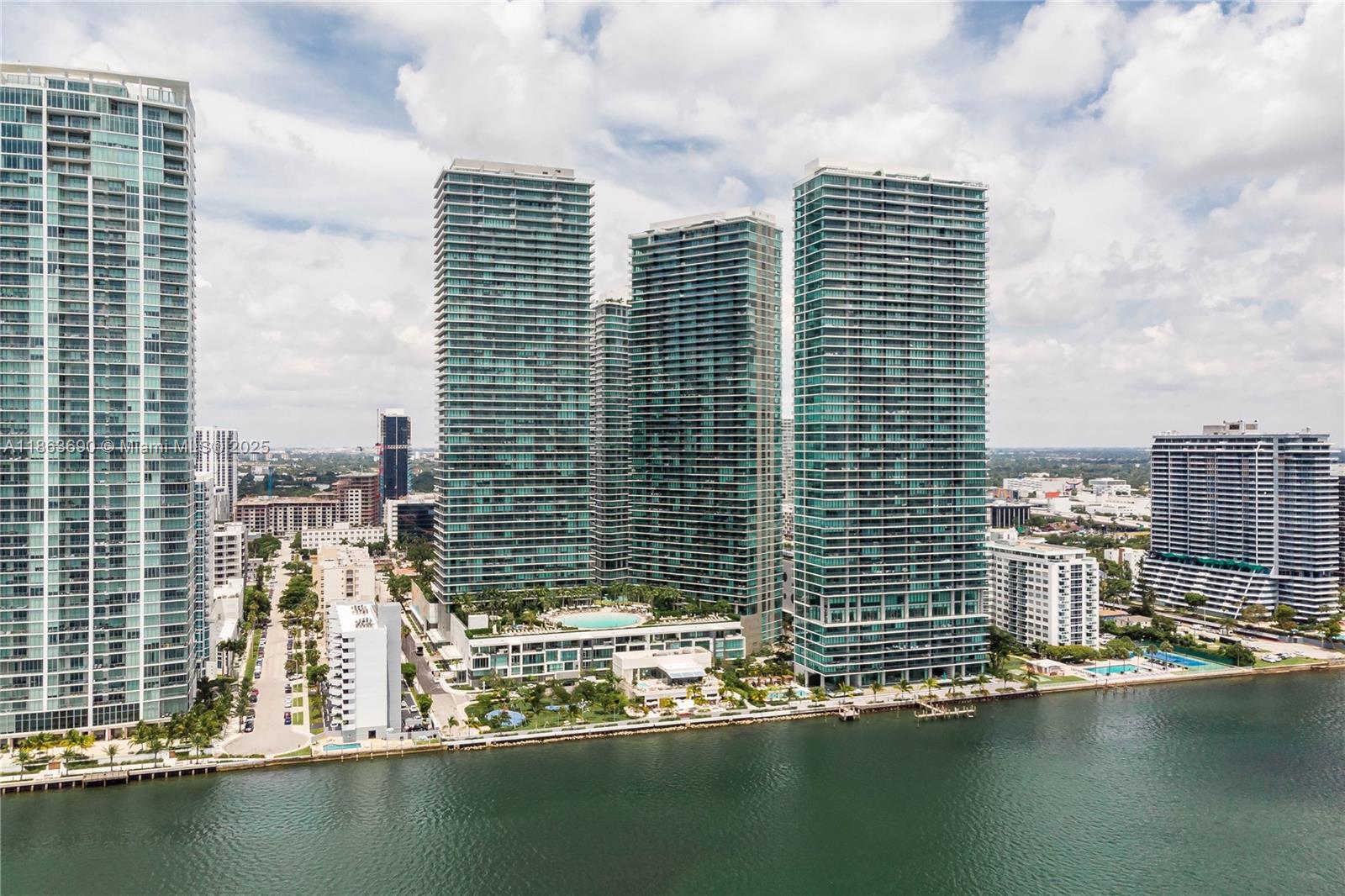 EDGEWATER – MIAMI’S PREMIER LOCATION
Turn-key 1BD/1.5BA fully furnished residence with stunning Biscayne Bay views. Features top-of-the-line appliances, washer and dryer, walk-in closet & assigned parking. Luxury amenities include rooftop pool, jacuzzi, sauna, steam room, BBQ area, state-of-the-art gym & spa, tennis, kids’ room, library, billiards & theater. 24/7 security & concierge. Exclusive access to Amara Beach Club, Michael Schwartz restaurant & marina. Walk to Midtown, Design District & Wynwood. Only 15–20 min to Miami Beach, Brickell, Coconut Grove & Coral Gables. Easy to show—call listing agent.
