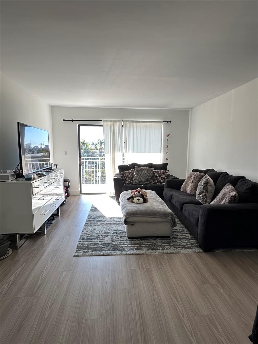 Normandy Isle, a residential community with bay views a modern well maintained 2/2 condo offers 1,068 sq. ft. of comfortable living space. Enjoy an open-concept living and dining space filled with natural light and central A/C, the master bedroom with a balcony, features a generous walk-in closet, split floor plan. One reserved covered parking space included. Laundry facility on each floor. The swimming pool has a bay water view. Walking distance from Normandy Isle Park & Pool, beaches, shopping, dining, and entertainment. AVAILABLE FEBRUARY 1!
