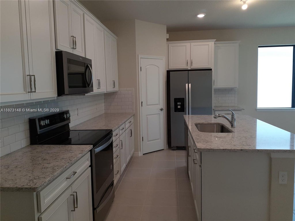 Photo of 8214 Hanoverian Dr #8214, Lake Worth, FL 33467 (MLS # A11373144)
