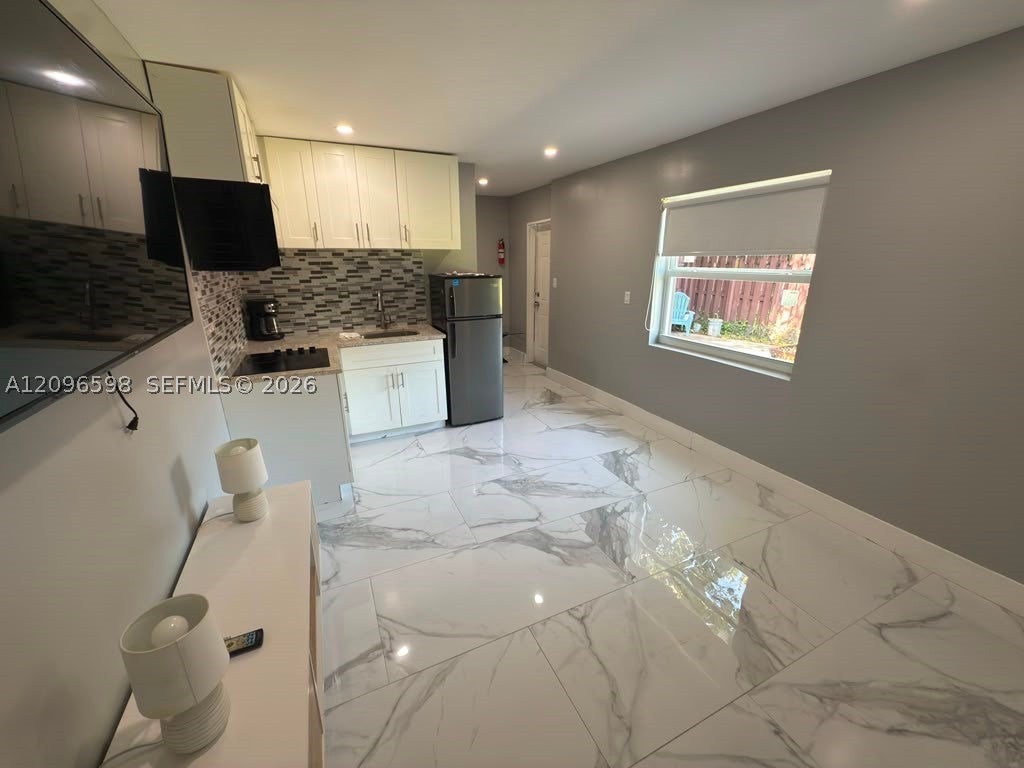 Photo of 4910 SW 28th Ter #1, Dania Beach, FL 33312 (MLS # A12096598)
