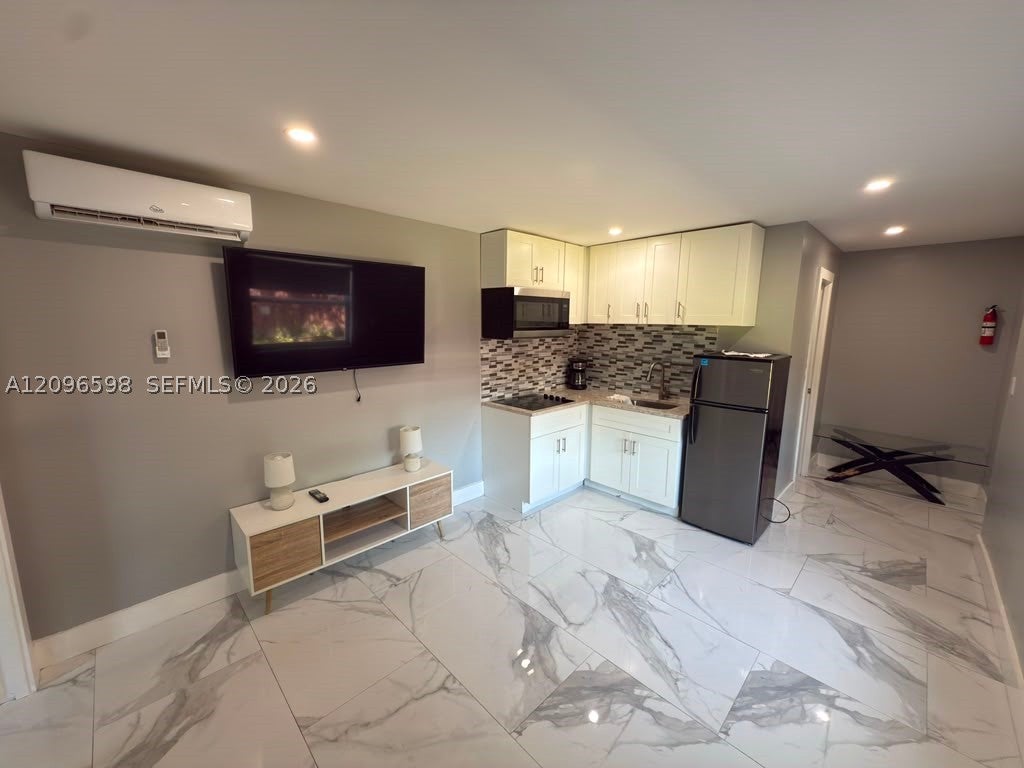 Photo of 4910 SW 28th Ter #1, Dania Beach, FL 33312 (MLS # A12096598)