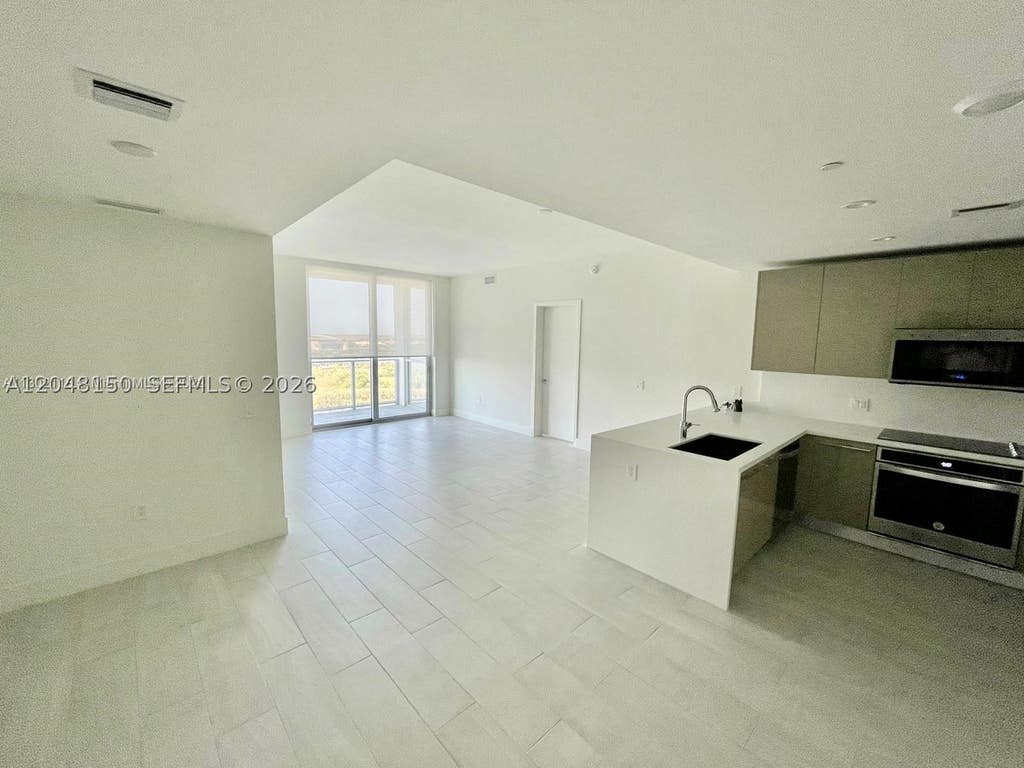 Photo of 2000 Metropica Way #1602, Sunrise, FL 33323 (MLS # A12048150)