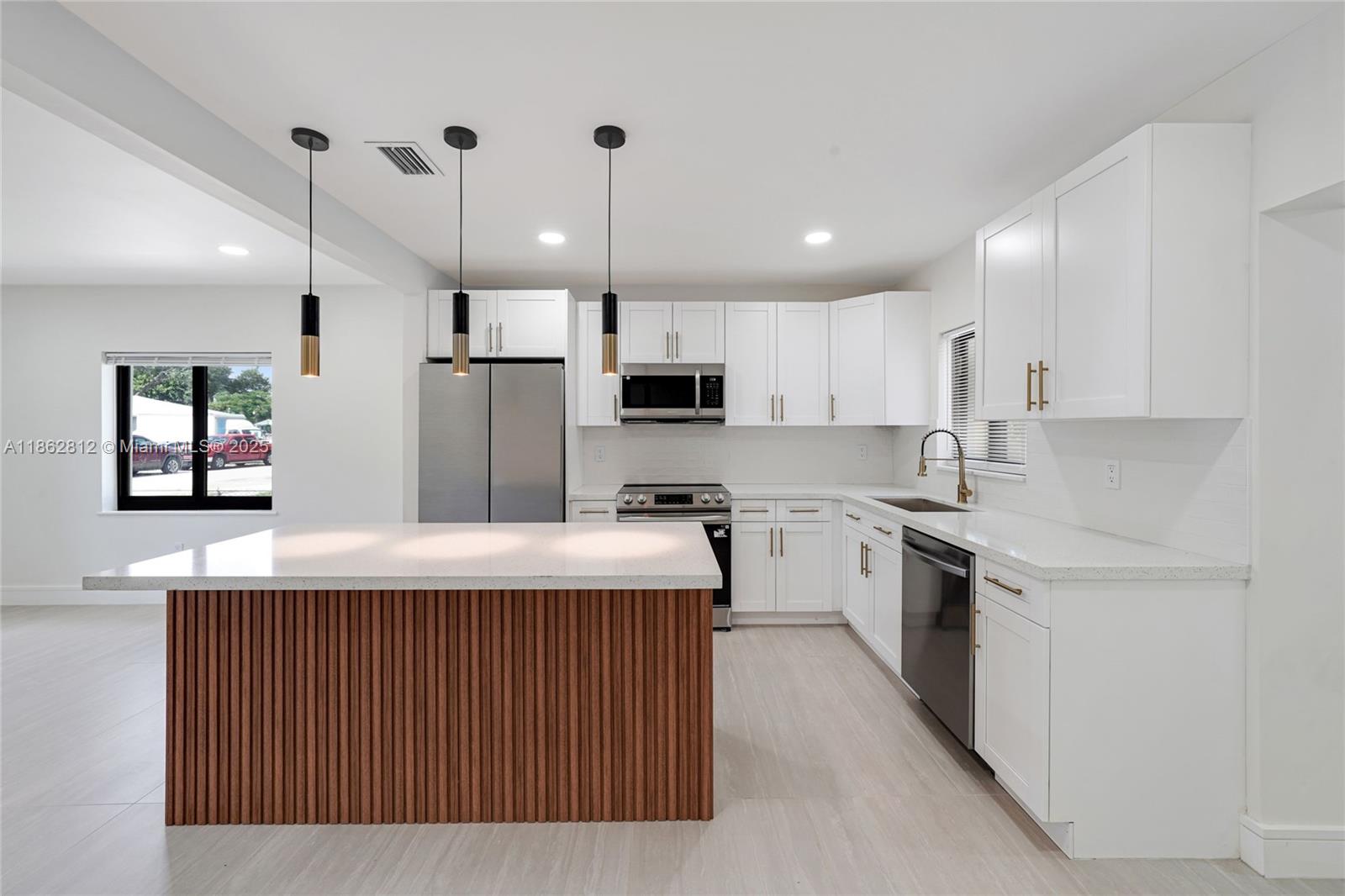 Fully Renovated single-family home featuring 4 bedrooms and 2 bathrooms, perfectly situated on a big lot just minutes from Wynwood, the Design District, and Midtown. Step inside to an open-concept layout filled with natural light. The spacious living and dining areas flow into a modern kitchen, complete with brand-new stainless steel appliances, tile floors, island, and custom cabinetry. Enjoy peace of mind with impact windows and plenty of gated parking. The large backyard offers endless possibilities. With no rental restrictions, this home is not only ideal for families but also a fantastic investment opportunity with Airbnb potential. Don't miss this change on an updated home in one of Miami’s most sought-after areas!
*Please contact Eial for showings - 310-562-6032