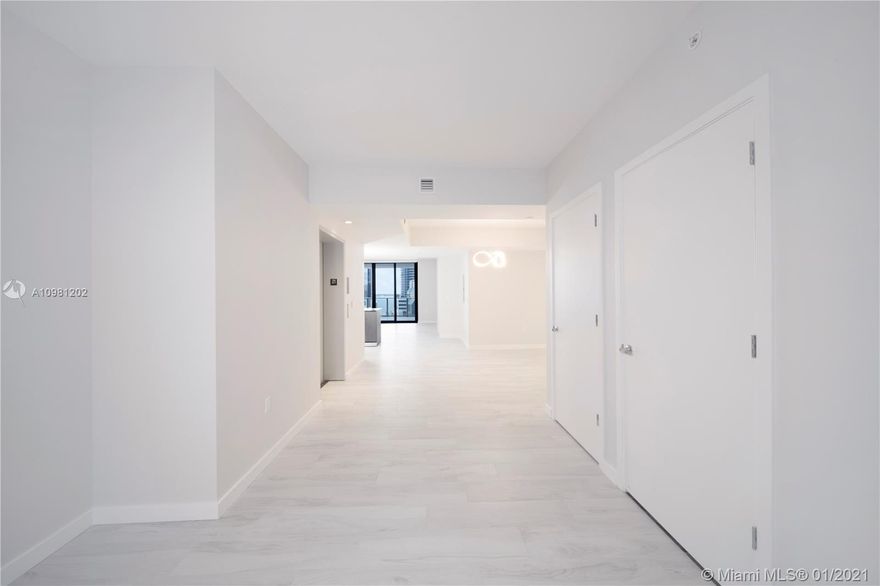 Stunning unit apartment completely renovated. This unit is the perfect size for an open kitchen area in the middle of master and second bedroom each with their own full bathroom, living and dining area, with beautiful front ocean view. This layout has an excellent feature, and it is the space that is open as a DEN to be occupied as you wish. It is perfect for a third bedroom, studio room or storage. Any use you decide for this space will have the 3er full bathroom next to it. Light fixtures up to date, floating mirrors with LED lighting effect, tile concrete decorative wall, motorized window treatment in all glass doors and windows, and grey color modern tones given to the walls in contrast with white color millwork makes this unit looks amazing.