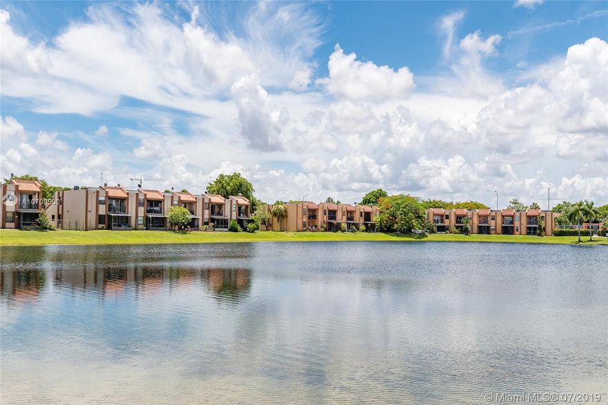 Enjoy lakefront serenity from the comfort of this 2 bedroom, 1.5 bath condo in Fontainebleau.  At over 1000 sq ft. of living area, this spacious corner unit is full of potential and ready for your special touch.  This unit has 1 assigned parking space with ample guest parking available on property.  Community offers tennis court and swimming pool as well-kept amenities, and provides on-site guard, all while boasting a low association fee!  Accordion shutters installed.  Conveniently located just minutes away from FIU, Dolphin Mall, International Mall, Target, Restaurants, and Miami International Airport. Easy access to 836 and FL-Turnpike.