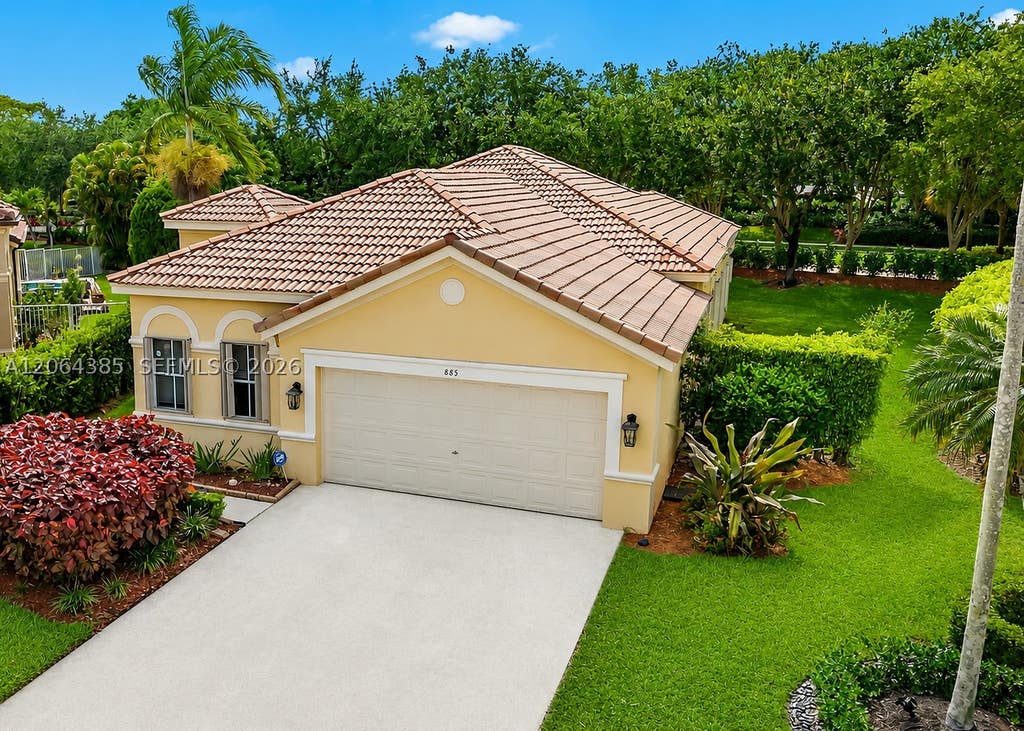 Photo of 885 Tanglewood Cir #885, Weston, FL 33327 (MLS # A12064385)
