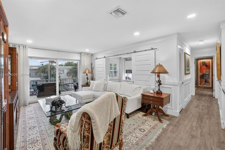 This fully remodeled condo offers modern waterfront living with style and comfort. The kitchen features new cabinetry, hardware, a larger farmhouse-style stainless steel sink, under-cabinet lighting, and a stainless and porcelain backsplash. Bathrooms have been fully updated with new vanities, while new doors, ceiling fans, and crown molding enhance the living spaces. Hurricane impact glass and sliding doors provide added security. The unit also includes a full-size washer and dryer, LED lighting, and a WiFi-enabled thermostat, lighting, and door lock for added convenience.

Enjoy a prime location near the beach and a gated, resort-style community featuring six tennis and pickleball courts, four heated pools (including one with a bar), a gym, bike storage, and barbecue areas.