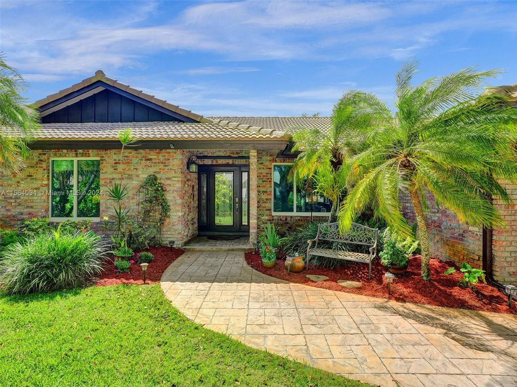 Photo of 5166 NW 81st Ter, Coral Springs, FL 33067 (MLS # A11564094)