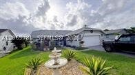 Photo of 7112 NW 107th Ave, Tamarac, FL 33321 (MLS # A12065781)