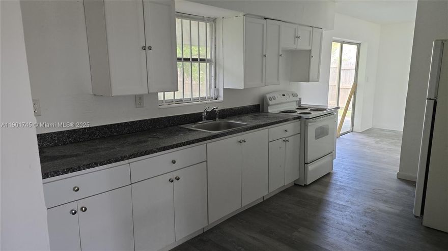 Recently remodeled CUTE 4 BEDROOM/2 BATHROOM. This 2-STORY HOME OFFERS SPACIOUS ROOMS ON A QUIET STREET. Hughe backyard