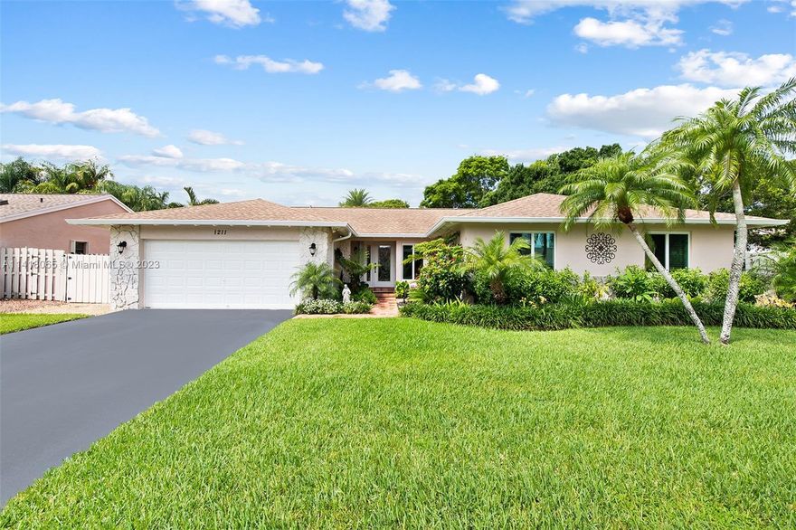 Beautiful home on a very large corner lot in desirable Shenandoah community, offers an open split bedroom floorplan, formal living and dining room, spacious updated eat-in kitchen, updated bathrooms, a private backyard terrace  to enjoy serene views of a  pond and lush landscaping. New hurricane impact windows and new roof.
Sprinkler system and low homeowner association fees.