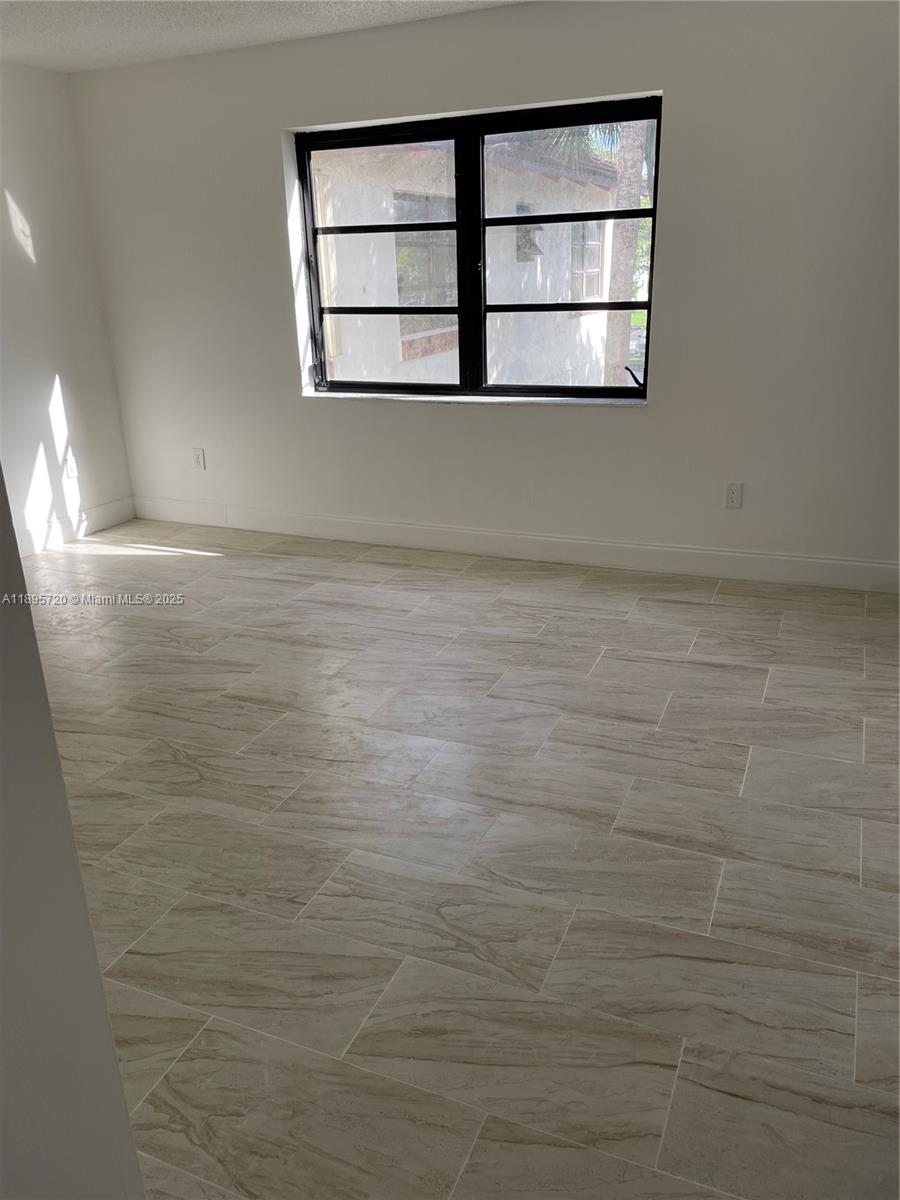 LAGO DEL REY CONDO #3 - Residential Lease