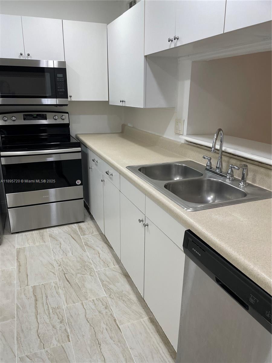LAGO DEL REY CONDO #3 - Residential Lease