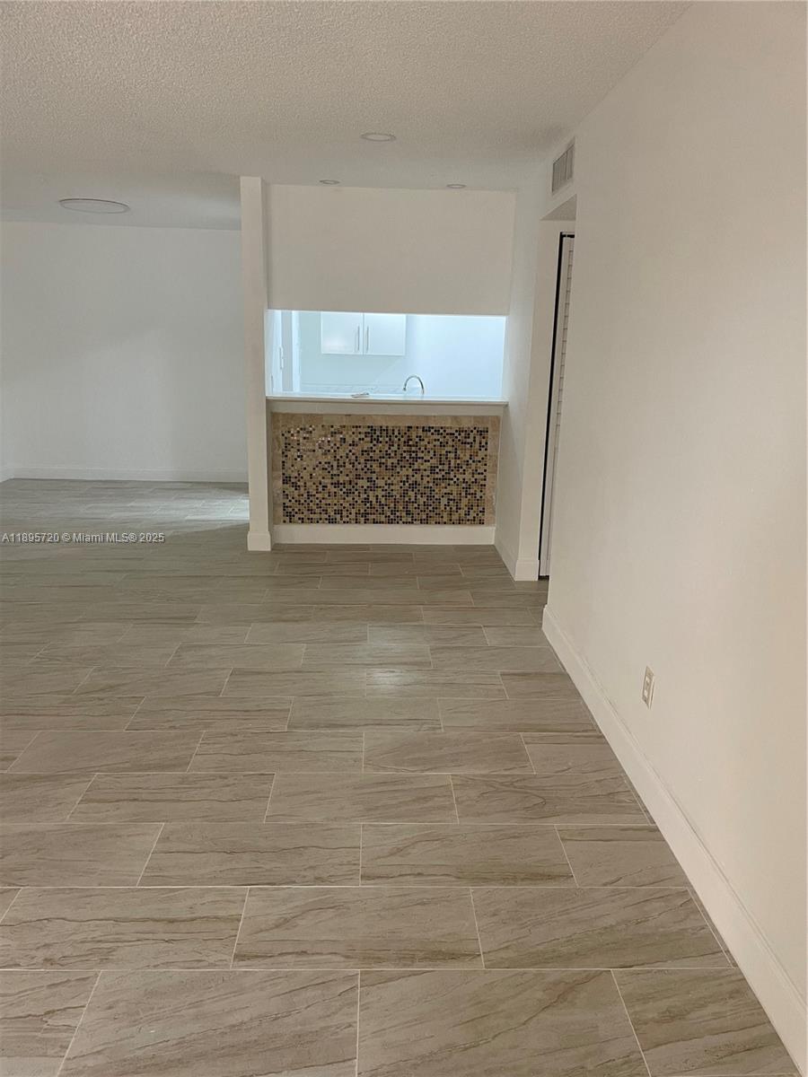 LAGO DEL REY CONDO #3 - Residential Lease