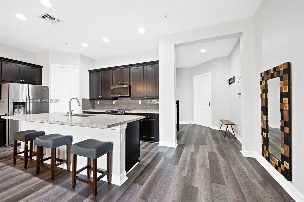 Photo of 11724 SW 13th Ln, Pembroke Pines, FL 33025 (MLS # A11990733)