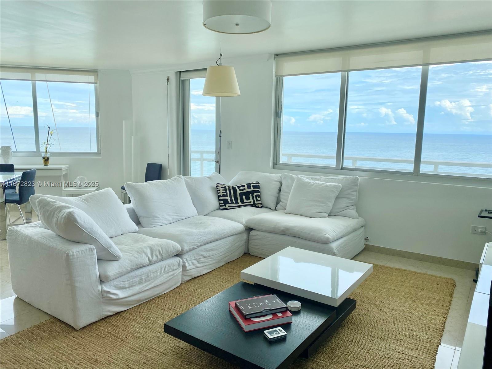 Spectacular Ocean Views! Welcome to this bright 2-bedroom, 2-bath residence in Miami Beach—a true sanctuary where the ocean meets the sky. Featuring a spacious living and dining areas next to an open kitchen with an island for a bar area. The unit includes a beautiful den for additional extra space. The Master Bathroom includes a corner bath tub and a separate shower together with a bidet. Washer and dryer inside the unit for convenience. Enjoy resort-style amenities including a brand new pool, fitness center, concierge, and direct beach access. Situated in a prime Miami Beach location, walking distance to shops, restaurants, banks... this home is perfect for luxury coastal living.