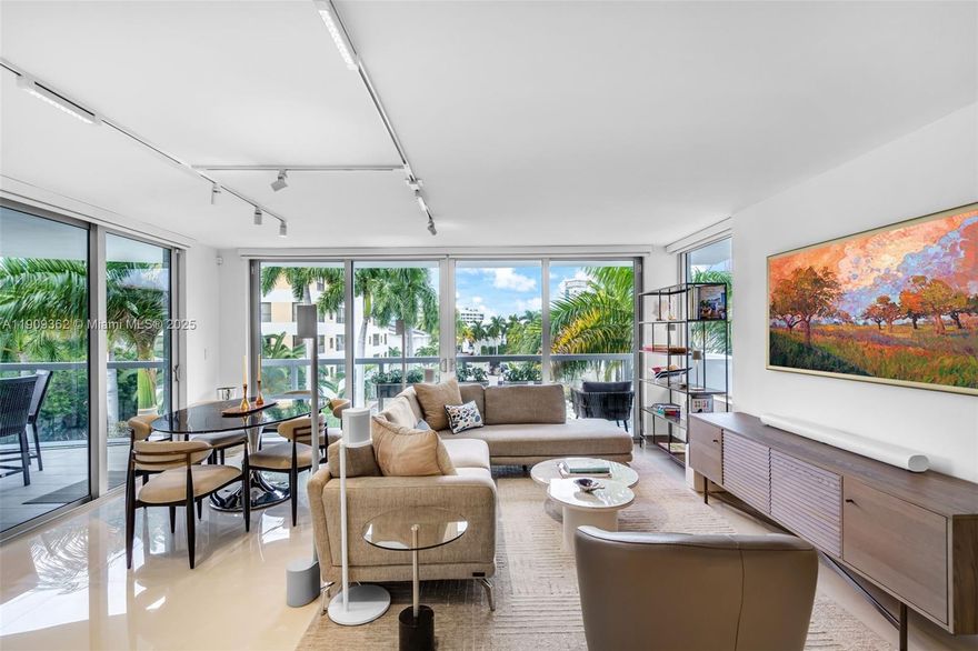 Luxuriously upgraded 3-bedroom corner residence in a newer boutique Bay Harbor building. High-end designer finishes, triple-exposure floor-to-ceiling impact glass, and custom gallery lighting highlight the open great room. Features include Lutron dimmers, finished closets, and motorized shades. The kitchen offers a custom backsplash, quartz counters, and upgraded appliances. Oversized primary suite with sitting area and large en-suite bath; second bedroom also with en-suite. Flexible third bedroom/office with built-in Murphy bed and access to the terrace. Rare zero-minimum rental policy allows immediate income potential. Two side-by-side parking spaces on the 2nd floor near elevator, plus storage. Minutes to A-rated K-8 school, beaches, Bal Harbour Shops, and dining.