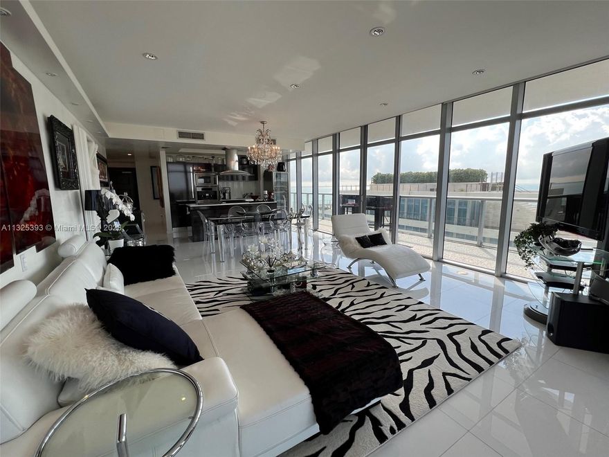 Beautiful Corner Unit with great views of Ocean, intracoastal and Skylines of Miami and South Beach! This property is beautifully furnished, white porcelain floor, Eletric Shades and black-outs in the living room and bedrooms. All rooms have dimmable lighting. Thats a desirable building with luxury lifestyle, where you will have beach and pool service, spa, Gym, business center, Media Room, Valet Parking, and everything only few minutes away from the best shops and restaurants of Miami Beach. THATS A MUST SEE!!!