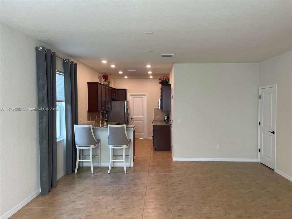 Photo of 1030 Eucalyptus Dr #6, Hollywood, FL 33021 (MLS # A11479259)