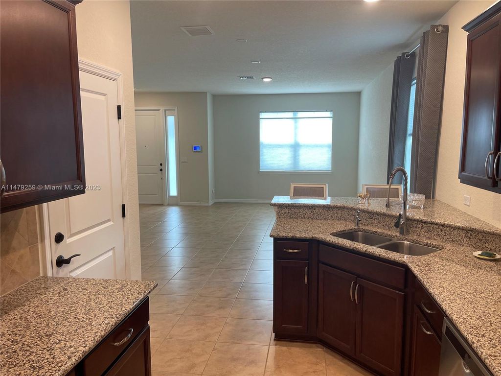 Photo of 1030 Eucalyptus Dr #6, Hollywood, FL 33021 (MLS # A11479259)
