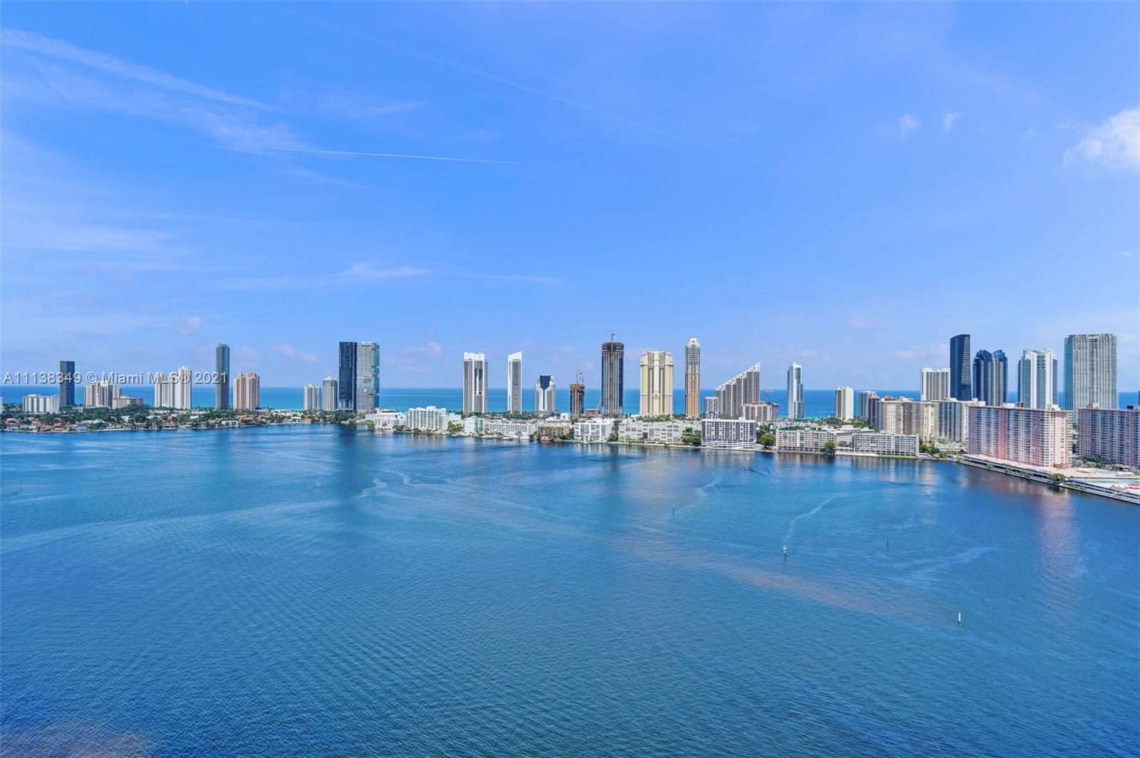 STUNNING DESIGNER APPOINTED 4,400+ SQ FT TOWER SUITE WITH 270 DEGREE WRAP AROUND TERRACE WITH VIEWS OF THE OCEAN, INTRACOASTAL AND CITY......3 BEDROOM 4.5 BATHROOM UNIT. COMPLETELY RENOVATED WITH HIGHER CEILINGS & NEW IMPACT WINDOWS AND DOORS....CUSTOM DESIGNED LAYOUT WITH FORMAL GREETING ROOM, SPECTACULAR GREAT ROOM, FORMAL DINING ROOM, EAT IN KITCHEN, DEN, MASTER SUITE WITH HIS AND HER BATHROOMS. LIVE IN THE PRESTIGIOUS WILLIAMS ISLAND WITH FULL AMENITIES: 3 RESTAURANTS, 16 TENNIS COURTS, 27,000 SQ.FT. SPA, MARINA, WALK/JOG TRAIL, PLAYGROUND, COURTESY BUS, WALK TO WILLIAMS ISLAND SYNAGOGUE, A+ SCHOOLS, DINING AND SHOPPING.