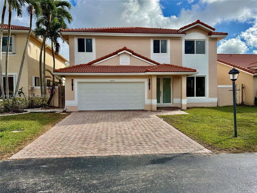 Be the first to enjoy this completely remodeled home, located in the gated community of Jasmine at the Hammocks. This home boosts four bedrooms, two and a half bathrooms and spacious living areas with designer finishes throughout. Large windows and sliding glass doors fill the home with natural sunlight. Modern kitchen with new state-of-the-art appliances, quartz countertops and designer cabinets. Porcelain flooring throughout the home. Staircase leads to the Primary bedroom with 2 walk-in closets, an extra sitting room leading to an open balcony and a primary bathroom designed with exquisite features including stand-alone tub, walk-in shower, dual vanity and bidet.  Additional bedrooms have large closets. Other features: Modern lighting and fixtures, New ACs (2), Pool with New Pool equipment, Full Impact Windows and Doors and a 2 car garage. Rent includes pool maintenance. The Hammocks recreation facility offers a clubhouse, pool, gym, tennis courts and more!