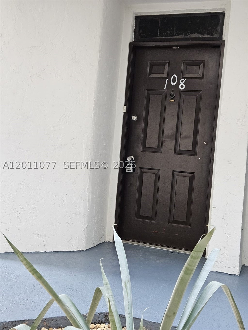 Photo of 211 Lake Pointe Dr #108, Oakland Park, FL 33309 (MLS # A12011077)