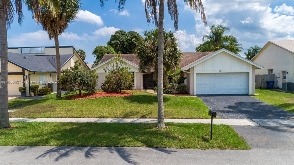 Photo of 7374 NW 48th St, Lauderhill, FL 33319 (MLS # A11809537)