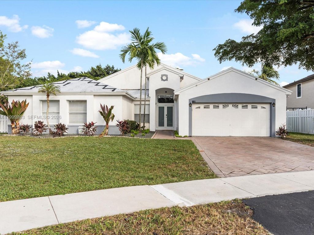 Photo of 1124 NW 130th Ter #1124, Sunrise, FL 33323 (MLS # A11999993)