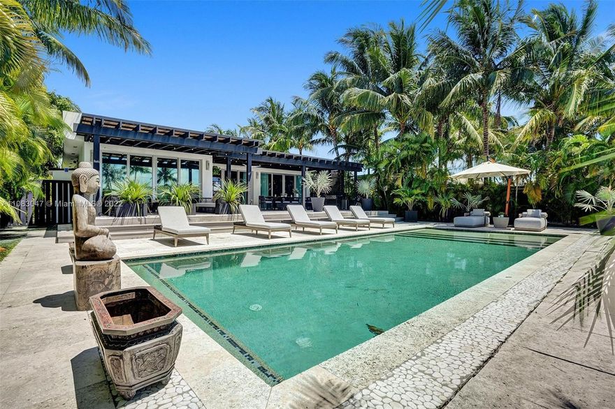 This exclusive and peaceful waterfront MASTERPIECE is located in the Miami Beach gated community of Normandy Shores. This home features 4 bedrooms and 4.5 bathrooms. It has been completely renovated in 2021 from the structure to the latest upgrades, using the best selection of high-end construction materials, including Italian Pocelanosa floors throughout, a new wine cellar, new light fixtures and window treatments; new additional storage rooms, and more. Enjoy the breathtaking outdoor space, a large pool, with the new and expansive covered area for dining and entertaining. The dock is fully equipped with a boat lift and floating dock for jet ski.  Showing only by Appointment During week days ONLY from 2:00-m to 4:00pm with PF or pre approval Letter. See brokers Remarks