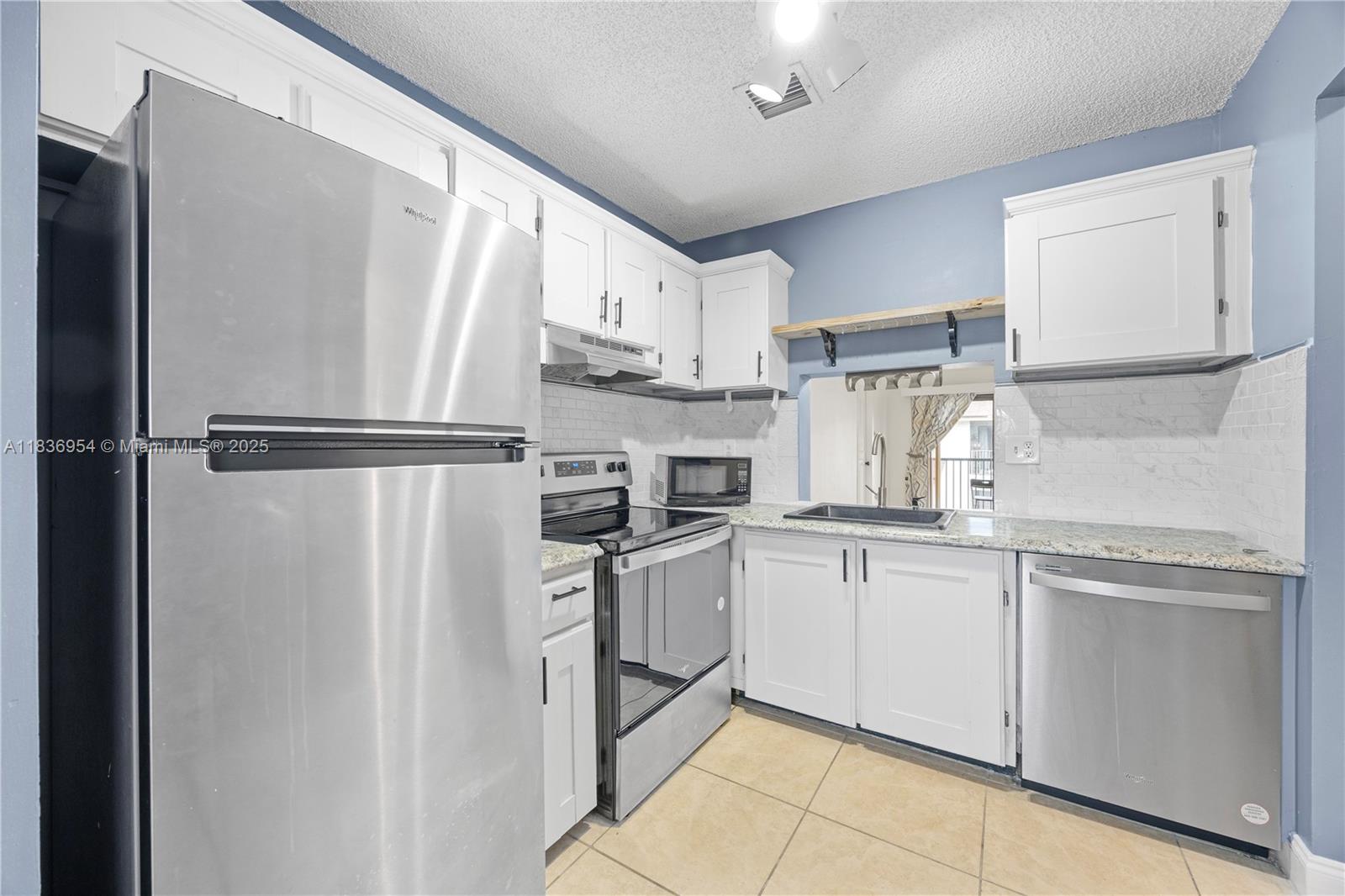 164 NW 60th Ave 2-3