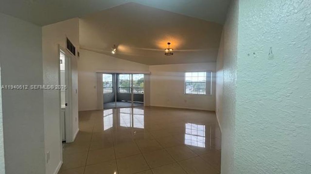 Photo of 2881 N Oakland Forest Dr #309, Oakland Park, FL 33309 (MLS # A11940612)