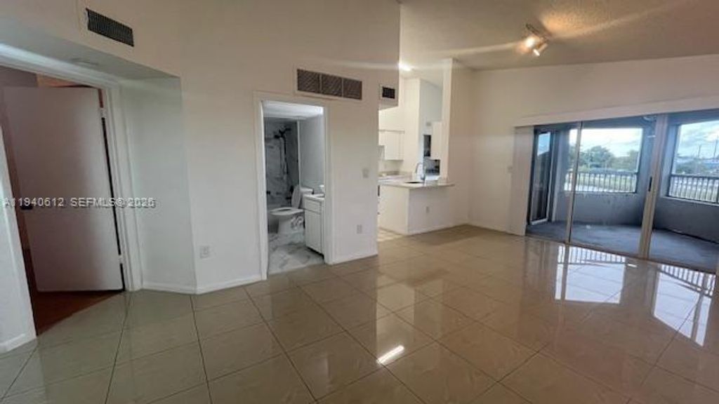 Photo of 2881 N Oakland Forest Dr #309, Oakland Park, FL 33309 (MLS # A11940612)