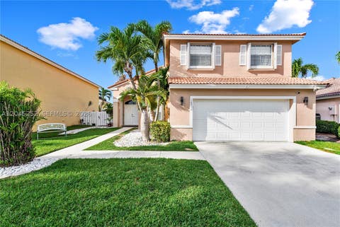 Photo of 18910 NW 10th Ter, Pembroke Pines, FL 33029 (MLS # A12045252)